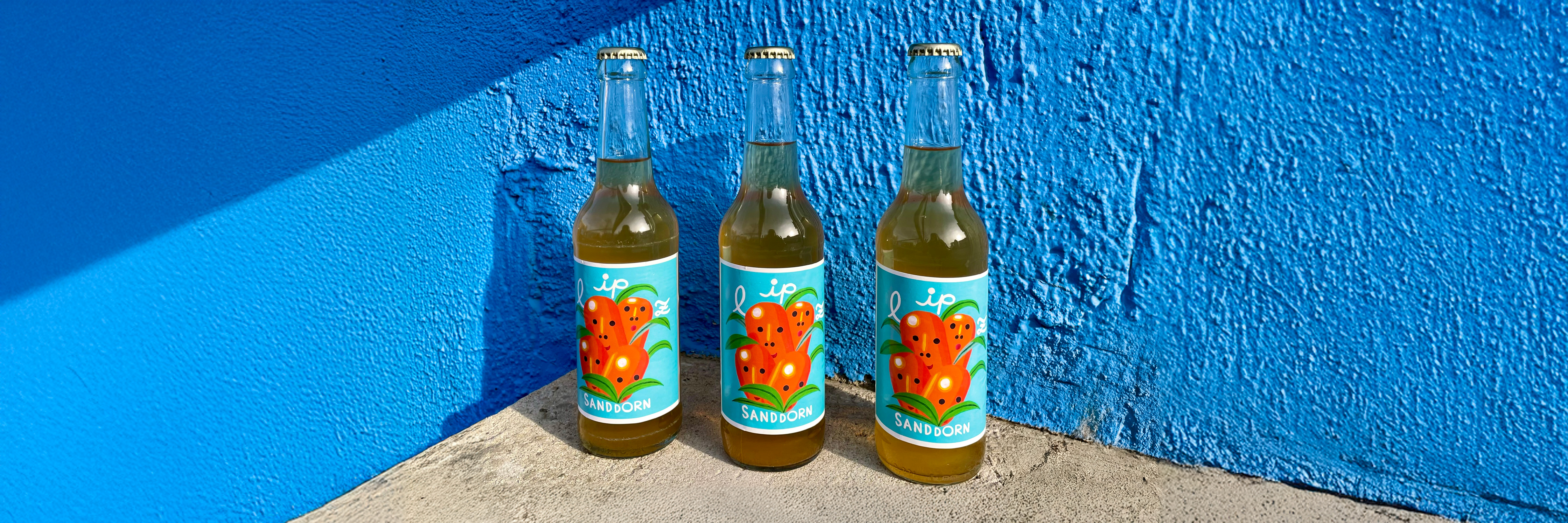 Kopfgrafik mit Limonadenflaschen